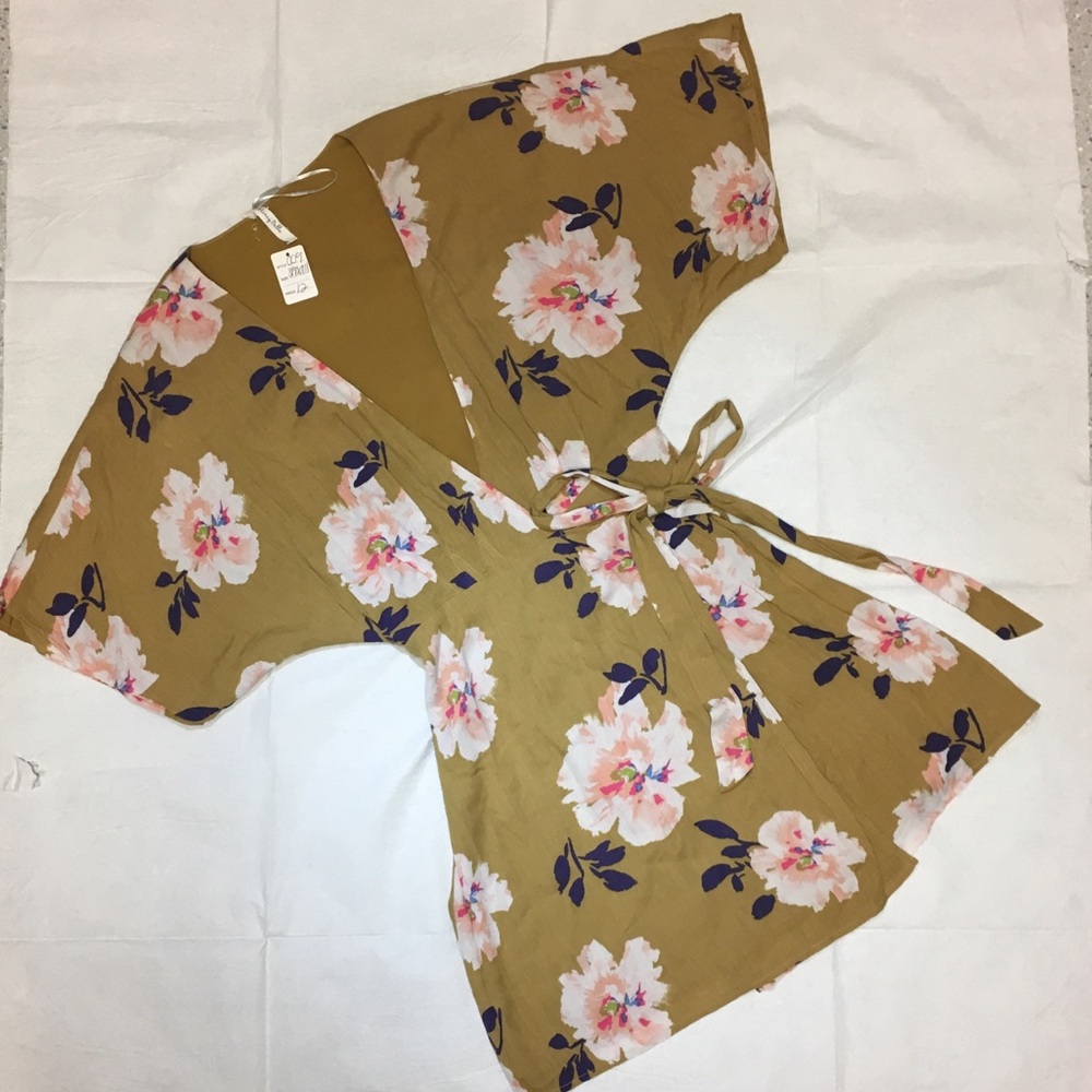 Wrap Floral Dress. Never worn. Tag attached.